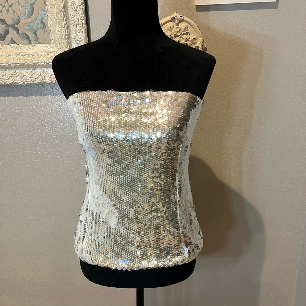 White sequin tube top with silver shine to it.